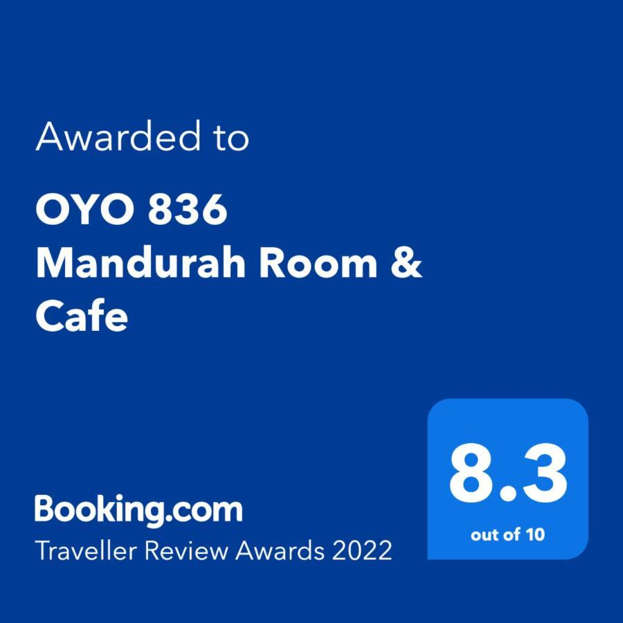 โอโย 836 มันดูระฮ์ รูม แอนด์ คาเฟ Hotel กูชิง ภายนอก รูปภาพ